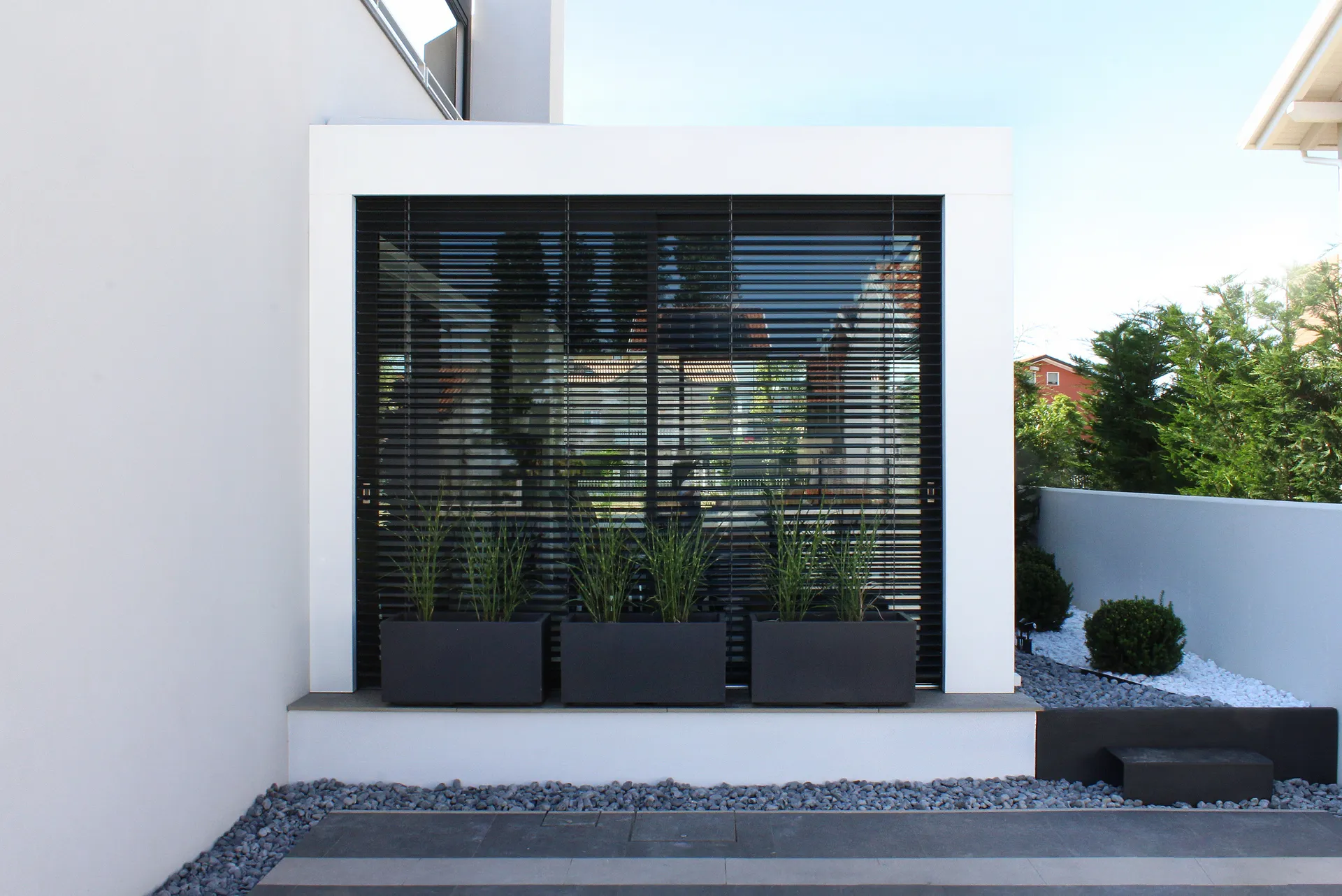 Giardino d'inverno Qubo con vetrate e struttura su misura