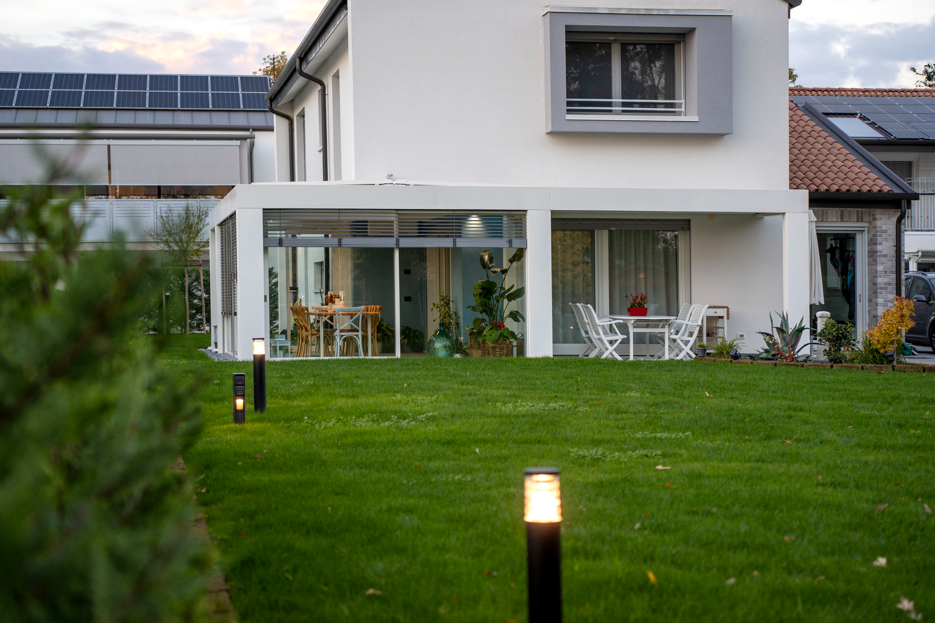 Giardino d'inverno Qubo con vetrate e struttura su misura